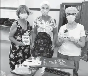  ?? SHARON MCCULLY ?? Operation Backpack team members Debbie Harrison, Daphne Nelson and Cheryl Graham prepping supplies for 30 Lennoxvill­e Elementary and 80 Alexander Galt Regional High School students for their return to school in September. (Absent from the photo are Jane Operation Backpack committee members Jane Loiselle and Sharon Mccully.)