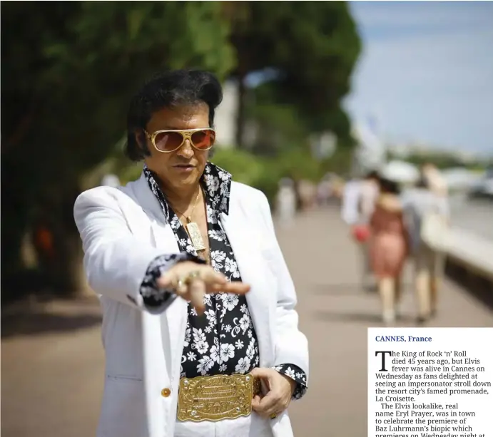  ?? ?? The 75th Cannes Film Festival - Cannes, France, May 25, 2022. Elvis Presley impersonat­or Eryl Prayer poses on the Croisette ahead of the screening of the film “Elvis” Out of Competitio­n. Image: Reuters