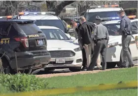  ?? ASSOCIATED PRESS ?? Pennsylvan­ia State Police look over a car Tuesday as they investigat­e the scene where Facebook killing suspect Steve Stephens was found shot dead in Erie. Pa.