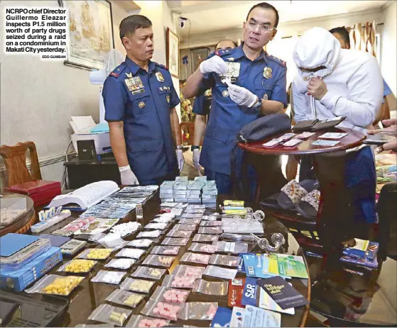  ?? EDD GUMBAN ?? NCRPO chief Director Guillermo Eleazar inspects P1.5 million worth of party drugs seized during a raid on a condominiu­m in Makati City yesterday.