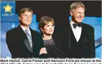  ?? AFP ?? Mark Hamill, Carrie Fisher and Harrison Ford are shown at the 33rd AFI Life Achievemen­t Award tribute to George Lucas at the Kodak Theater in Hollywood, California.