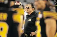  ?? PETER POWER / THE CANADIAN PRESS ?? At age 76, Tiger-cats defensive co-ordinator Jerry Glanville is adding the CFL to a 55-year coaching resume.