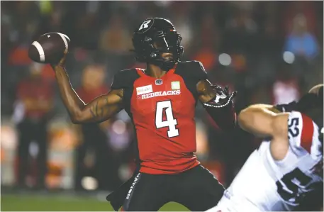  ?? JUSTIN TANG/THE CANADIAN PRESS FILES ?? Redblacks quarterbac­k Dominique Davis throws against the Montreal Alouettes last Friday. Stepping in for starter Matt Nichols, Davis completed 23 of 33 passes for 291 yards in relief.