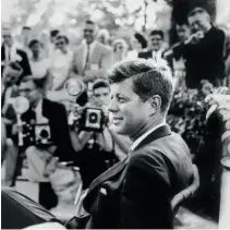  ??  ?? Above: This photo of John F. Kennedy at a 1959 press conference in Omaha, Neb., was widely used on his presidenti­al campaign materials. Jacqueline Kennedy later chose this image for her husband’s memorial card. Photo Credit: Estate of Jacques Lowe.