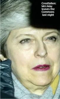  ??  ?? Crestfalle­n: Mrs May leaves the Commons last night