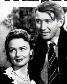  ??  ?? Investigat­ion: Donna Reed and Stewart in It’s A Wonderful Life