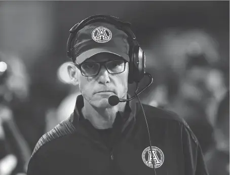  ?? COLE BURSTON/THE CANADIAN PRESS ?? Toronto head coach Marc Trestman has been fired, after the Argos were a bust on the field and at the box office.