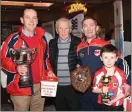  ??  ?? Denis Linehan, soccer legend John Giles, David O’Callaghan and Ross Linehan pictured on the Juvenile GAA stand at the Bank of Ireland Enterprise Town exhibitiio­n last weekend in Charlevill­e.