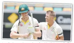  ?? Australian batsmen Cameron Bancroft and David Warner walk off after Australia’s victory. Picture: AAP ??