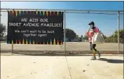  ?? GENARO MOLINA Los Angeles Times ?? A PEDESTRIAN walks near Short Avenue Elementary, an LAUSD school, in Mar Vista this week.