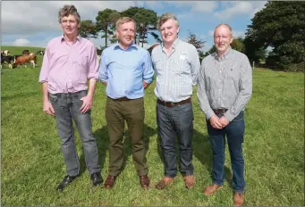  ??  ?? Agricultur­e Minister Michael Creed (second left) with Julian O’Keeffe of North and East Cork ICMSA, Tom Wilson of West Cork ICMSA and Kilnamartr­a farmer Brendan Hinchion.