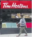  ?? THE CANADIAN PRESS ?? Tim Hortons called the franchisee­s’ proposed class action Friday “another unfounded lawsuit.”