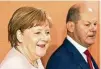  ??  ?? Kanzlerin Merkel und Finanzmini­ster Scholz.