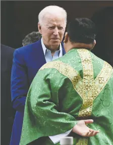  ?? OLIVIER DOULIERY/AFP VIA GETTY IMAGES ?? U.S. President Joe Biden speaks with a priest in Wilmington, Del., this month. U.S. Catholic bishops issued a challenge on June 18 to Biden over his support for abortion rights, agreeing to draft a statement on the meaning of holy communion which could potentiall­y be used to deny the sacred rite to the president.