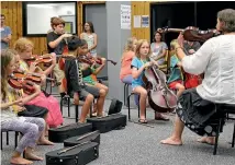  ?? PHOTO: FAIRFAX MEDIA ?? Learning music is enjoyable and well known to improve learning in other areas.