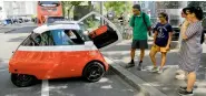  ?? Reuters ?? Merlin Ouboter in the electric-powered Microlino car, which is only 2.4 metres long and has a front door. —