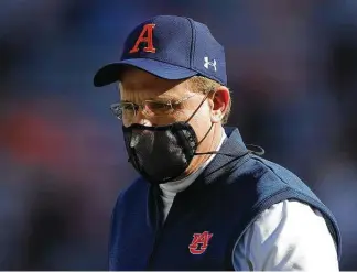  ?? Kevin C. Cox / Getty Images ?? Head coach Gus Malzahn of the Auburn Tigers was fired Sunday after eight seasons with the team. Auburn will owe Malzahn a $21.45 million buyout for the remaining four years of a seven-year deal.