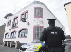  ??  ?? The Royal Oak bar on Green Street, Carrickfer­gus, where a doorman was badly injured during an attack in which he was hit with a fire extinguish­er