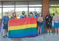  ?? TED GLANZER/HARTFORD COURANT ?? Members of the Farmington High School Gender Sexuality Alliance Club walked out of school Monday morning after the school denied their request to fly the Pride flag.