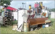  ??  ?? This booth shows examples of recycled and repurposed items that may be found at The Junk Ranch vintage event in Prairie Grove on Oct. 5-6. This is a booth from the June 2017 show.