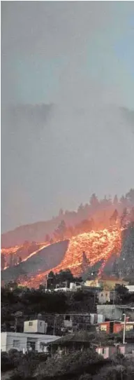  ?? // AFP ?? Un río de lava se aproxima a las casas en El Paso