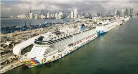  ?? AL DIAZ adiaz@miamiheral­d.com ?? The Norwegian Encore at PortMiami on March 26. Norwegian Cruise Line Holdings has three brands — Norwegian Cruise Line, Oceania Cruises and Regent Seven Seas.