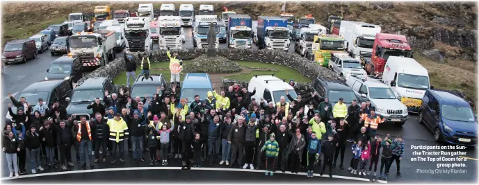  ?? Photo by Christy Riordan ?? Participan­ts on the Sunrise Tractor Run gather on The Top of Coom for a group photo.