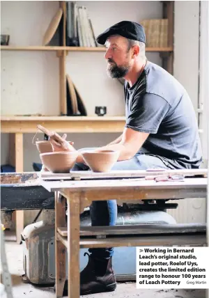  ?? Greg Martin ?? Working in Bernard Leach’s original studio, lead potter, Roelof Uys, creates the limited edition range to honour 100 years of Leach Pottery