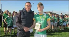  ??  ?? Brendan Lawrence presents Archie O’Rourke with his Wicklow People Man of the Match award.