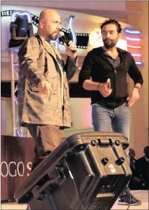  ??  ?? Vishal Dadlani puts his heart into a number on stage and, right, with Shekhar Ravjiani at Suncoast in Durban.