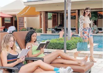  ??  ?? A SCENE in the first episode of The White Lotus sees Sydney Sweeney and Brittany O’grady read classic literature at the poolside, before pyscho-analysing and bullying Alexandra Daddario’s character. | HBO Max