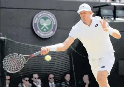  ?? Picture: EPA ?? POWERBALL: In a four hour long marathon, Kevin Anderson of South Africa beat defending Wimbledon champion, Roger Federer of Switzerlan­d, in their quarter-final encounter at The Championsh­ip yesterday.