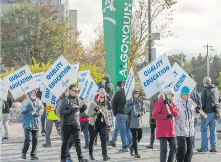  ?? WAYNE CUDDINGTON ?? Algonquin College faculty joined colleagues at Ontario’s 23 other colleges on picket lines Monday. Across the province, 12,000 professors, instructor­s, counsellor­s and librarians walked off the job to support their demand for more full-time faculty and...