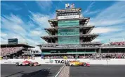  ?? AJ Mast/Associated Press ?? Josef Newgarden, right, crosses the finish line in front of Marcus Ericsson, of Sweden, to win the Indianapol­is 500 auto race at Indianapol­is Motor Speedway Sunday in Indianapol­is.