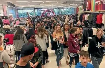  ?? PHOTO: BENN BATHGATE/STUFF ?? Crowds of keen shoppers flooded Rotorua’s Kmart when it opened its doors on Friday morning.