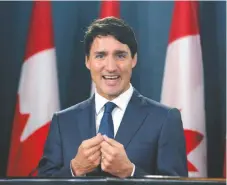  ??  ?? El premier de Canadá, Justin Trudeau, anunció ayer en Ottawa el nuevo pacto comercial entre Canadá, Estados Unidos y México.