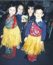  ?? ?? These pupils of Clondulane NS were delighted to show off their traditiona­l African dress when Beni Oburu visited for Africa Day 21 years ago.