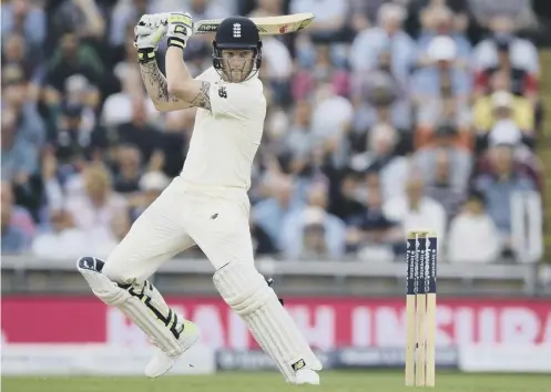  ??  ?? England all-rounder Ben Stokes cuts a ball to the boundary on his way to a century on the first day of the second Test at Headingley.