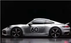  ?? ?? ELEMEN legenda Porsche dengan spoiler belakang ‘ekor itik’.