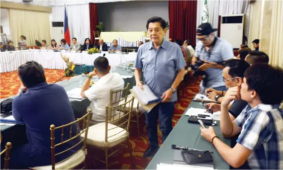  ?? SUNSTAR FOTO / ARNI ACLAO ?? COUNSEL, COUNCIL. Rep. Raul del Mar walks out of the Regional Developmen­t Council, saying a list of DPWH projects he’d been consulted about and signed wasn’t the same one presented in Friday’s council meeting.