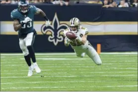  ?? SCOTT CLAUSE - THE DAILY ADVERTISER VIA AP ?? New Orleans Saints tight end Dan Arnold makes a diving catch during an NFL football game against the Philadelph­ia Eagles on Sunday, Nov. 18, 2018.