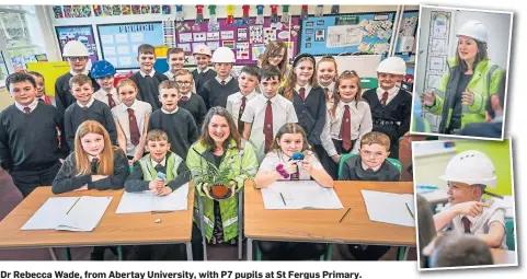  ??  ?? Dr Rebecca Wade, from Abertay University, with P7 pupils at St Fergus Primary.