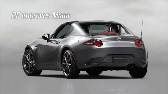  ??  ?? A sleek fastback rear end makes the Mazda Miata RF look somewhat like a pricey Italian sports car. It has a retractibl­e hard top that motors away at the touch of a button.