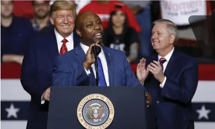  ?? Patrick Semansky/AP ?? Tim Scott speaks in front of Donald Trump and Lindsey Graham in North Charleston, South Carolina, in February 2020. Photograph: