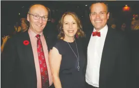  ??  ?? The Splash of Red Gala would not have been the success it was were if not for the invaluable support of Westjet. Pictured are Westjet’s Mark Porter, left, and Richard Bartrem, right, with his wife CJ Walker.