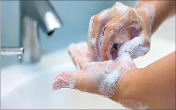  ??  ?? Wash your hands to keep the novel coronaviru­s at bay.