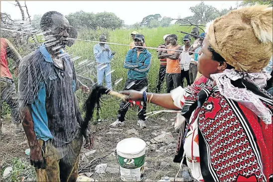  ??  ?? SPIRITUAL: In this file image, sangoma Rachel Ncube performs a ritual during a cleansing ceremony, a practice currently under the spotlight