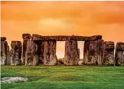  ??  ?? SACRED SITE: The summer solstice is famously celebrated at Stonehenge