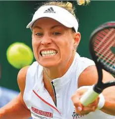  ?? AFP ?? Germany’s Angelique Kerber returns against US player Claire Liu during their second round match at Wimbledon.