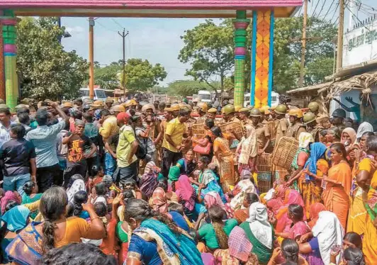  ?? PTI ?? PEOPLE CONVERGING at a place in Thoothukud­i town on the 100th day of the current protest. Cutting across caste and communal lines, people from all walks of life joined hands against the industry. The agitation turned violent later with the police action, including firing on the protesters.